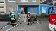 Prozess um Doppelbrand in Hochhaus: Betreuerin bestreitet Brandstiftungsvorwürfe