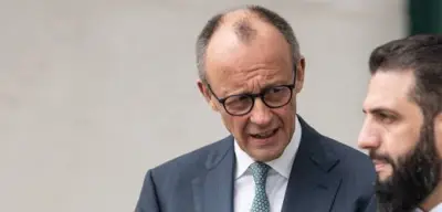 Merkels Nachfolger Merz stiftet mit Syrer-Rückkehr-Quote Verwirrung: Wer ist verantwortlich?