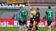 Gelbe Karten bedrohen Preußen Münster im harten Abstiegskampf der 2. Bundesliga