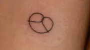 Polizist in Disziplinarverfahren wegen Brezel-Tattoo auf Grünen-Party