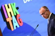 Merz: Keine höhere Einkommensteuer für Unternehmen