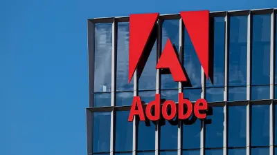 Adobe hebt Prognosen an, Finanzchef-Rückzug belastet Aktie