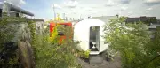 Berliner Passivhaus mit Wohnkapseln auf dem Dach fast ohne Heizkosten