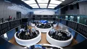 Deutsche Börse hebt Prognose nach starkem Quartal an