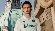 Hannover 96 präsentiert neues Ausweichtrikot mit Rathaus-Motiv